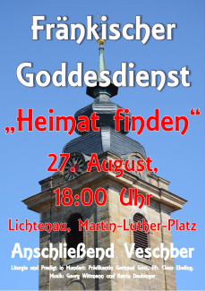 Kirchturm von Lichtenau vor blauem Himmel